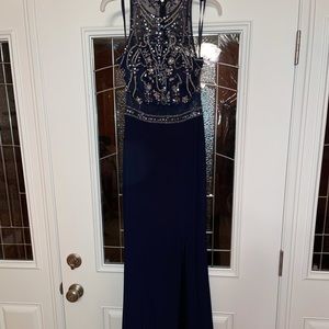 Great Party Dress! Navy Blue jersey material size 6 dress. Worn once. Has a slit